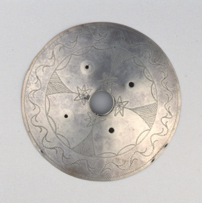 Top view of silver gorget before treatment
