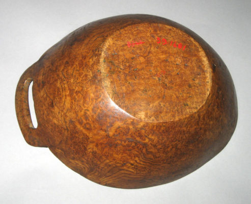 base of wooden bowl with one handle